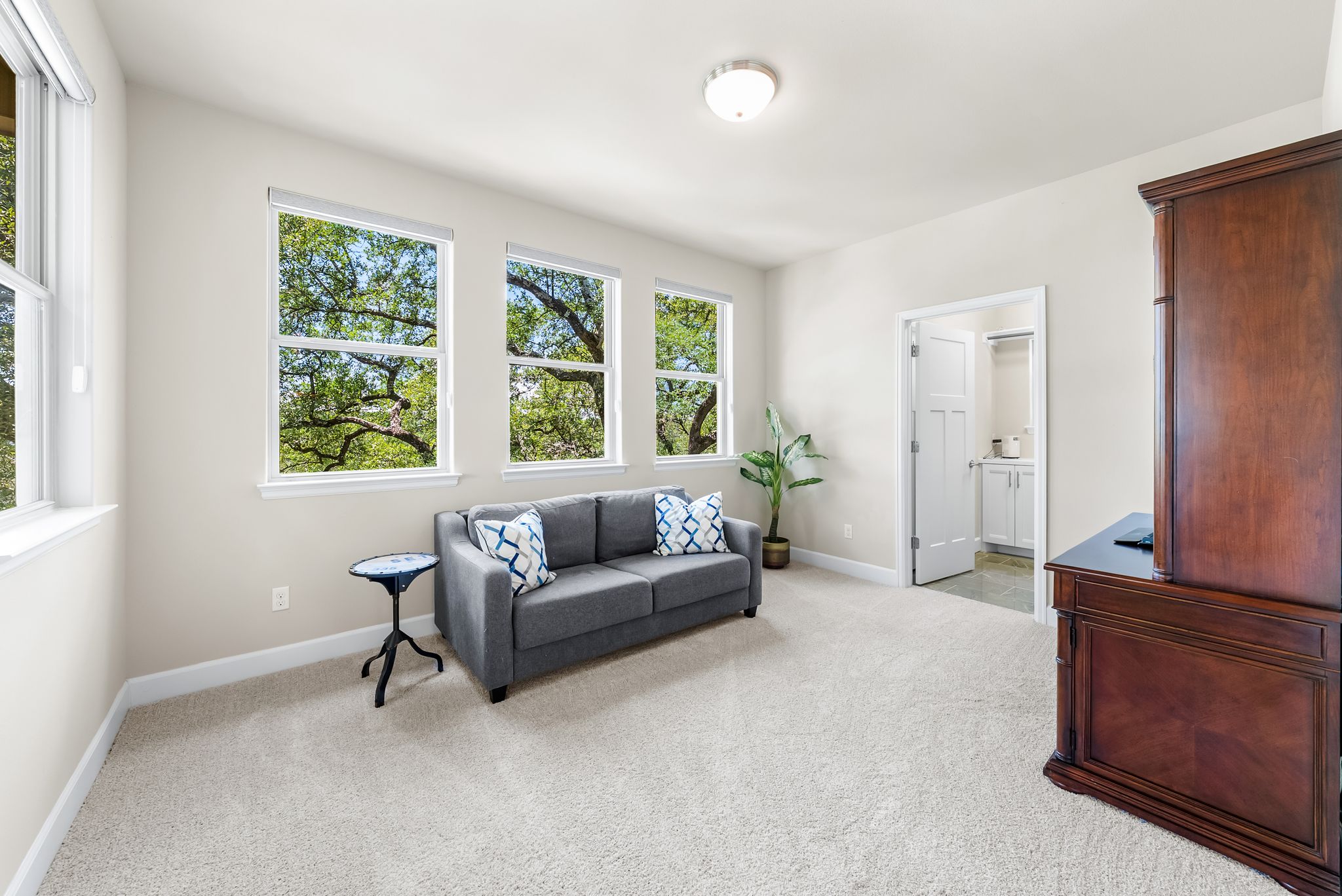 14213 Red Feather Trail Austin, TX 78734 - Photo 26 of 39 a living room with furniture and a window