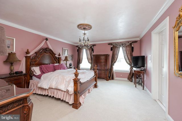a view of an empty room with stairs