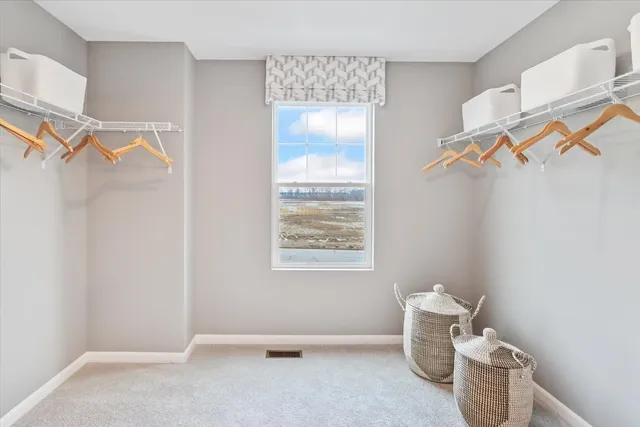 a view of a room with racks on the wall