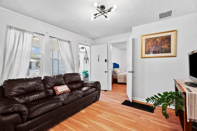 a living room with furniture and a couch