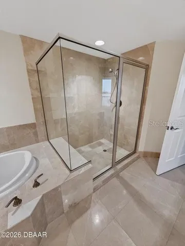 a bathroom with a sink and a shower