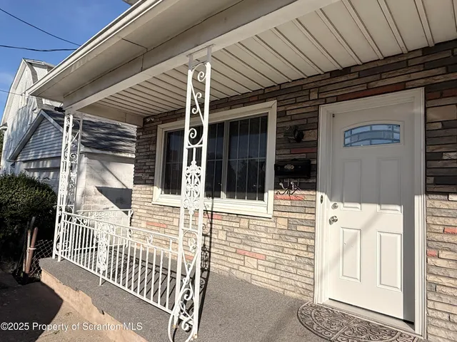 a view of a house with a porch