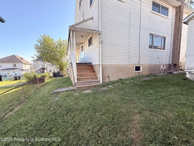 a view of backyard of house