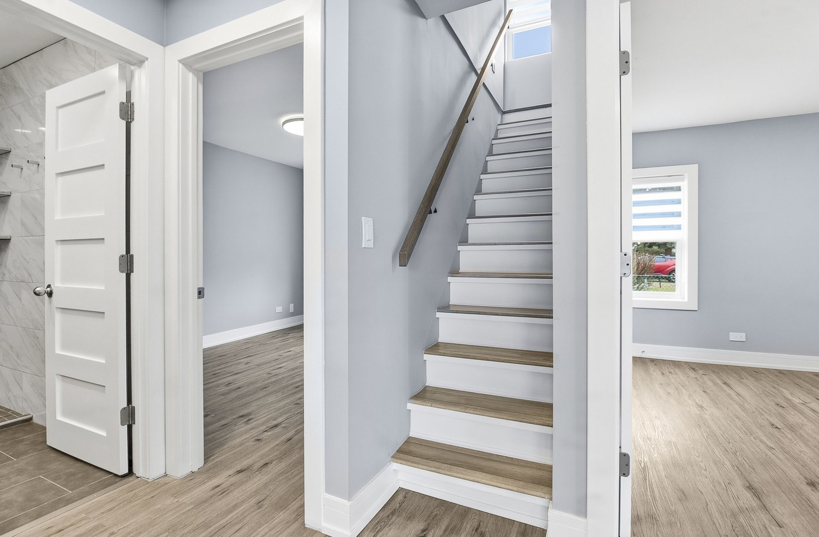 7303 West 75th Street Bridgeview, IL 60455 - Photo 23 of 48 a view of an entryway with wooden floor and entryway