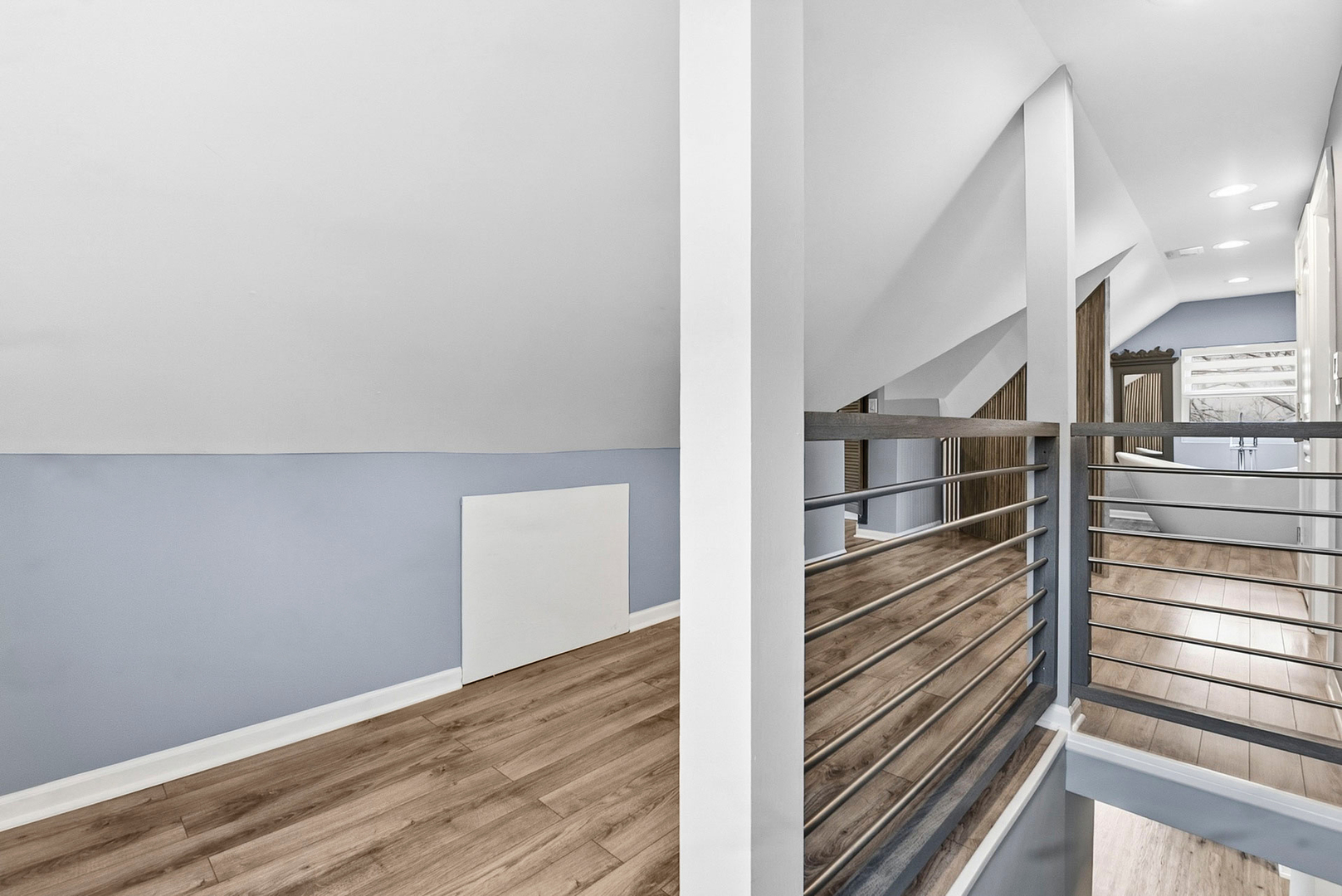 7303 West 75th Street Bridgeview, IL 60455 - Photo 24 of 48 a view of a hallway with wooden floor and staircase