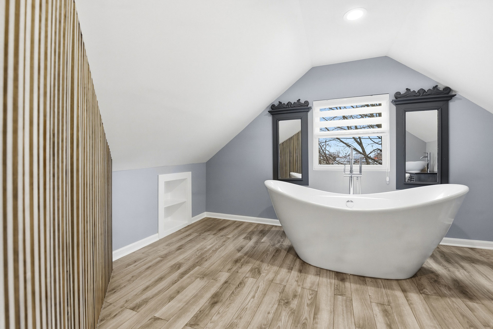 7303 West 75th Street Bridgeview, IL 60455 - Photo 29 of 48 a white bath tub sitting in a bathroom next to a window
