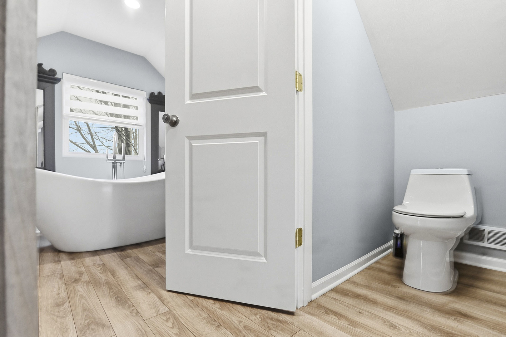 7303 West 75th Street Bridgeview, IL 60455 - Photo 32 of 48 a bathroom with a toilet and a sink