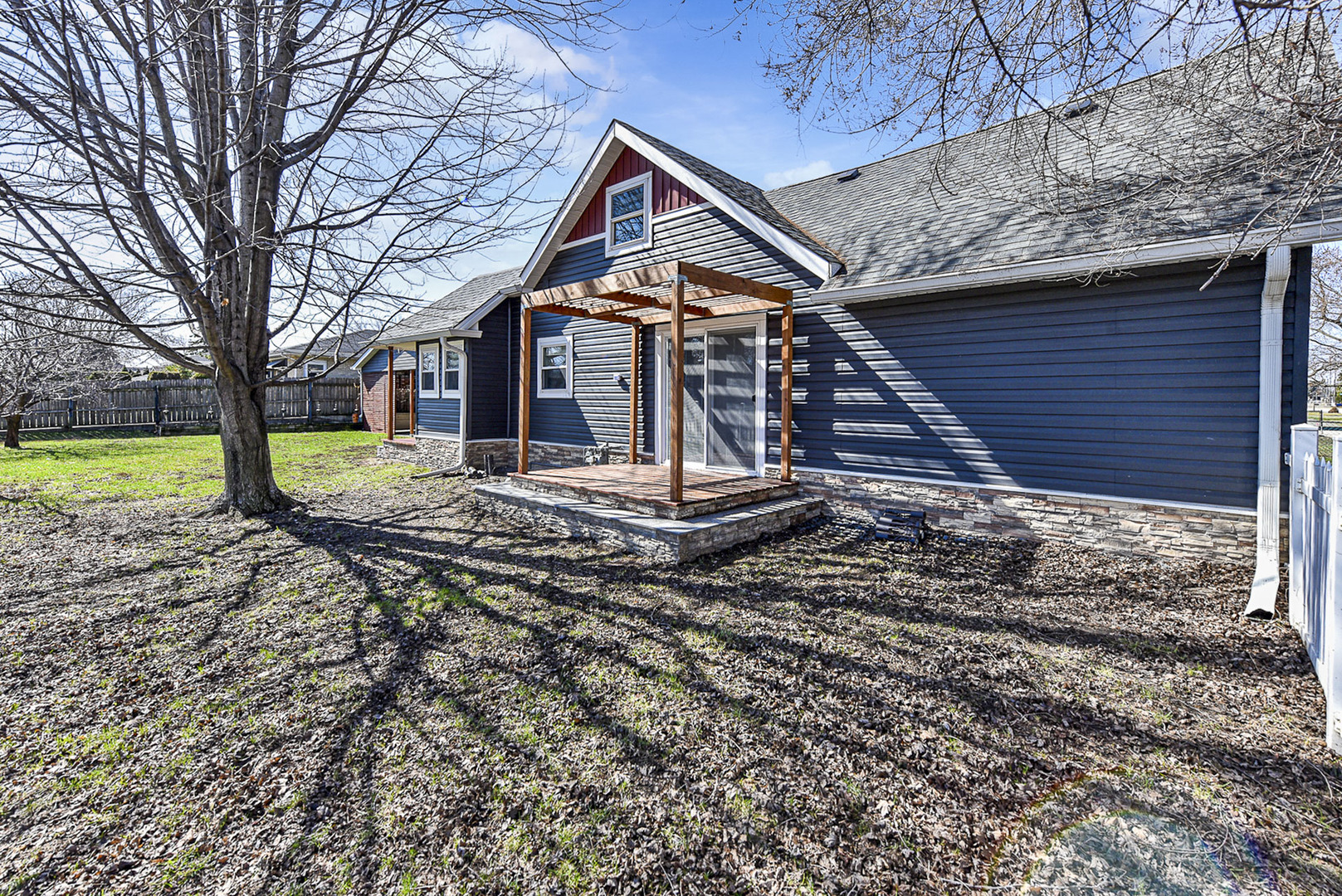 7303 West 75th Street Bridgeview, IL 60455 - Photo 40 of 48 a front view of a house with a yard