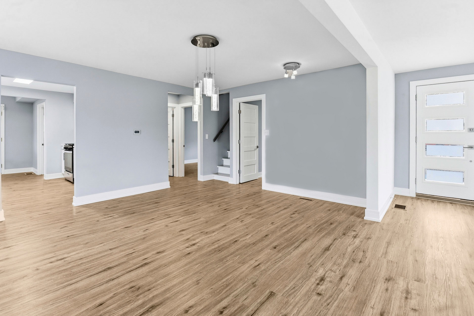 7303 West 75th Street Bridgeview, IL 60455 - Photo 6 of 48 a view of empty room with wooden floor