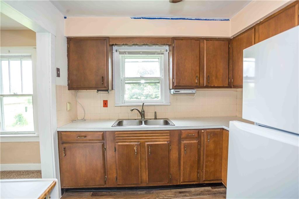 50 Ellenberger Road Indiana, PA 15701 - Photo 21 of 34 a kitchen with a sink a window and cabinets
