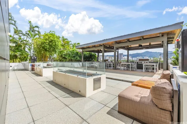 a view of a swimming pool with a patio