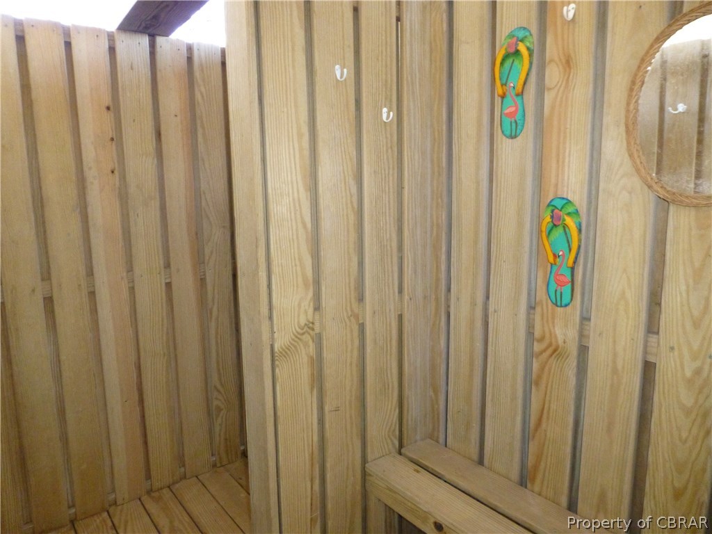 8 Chesapeake Shore Road Port Haywood, VA 23138 - Photo 23 of 26 HUGE outside shower on first level - clean off after a day on the beach and playing in the water!