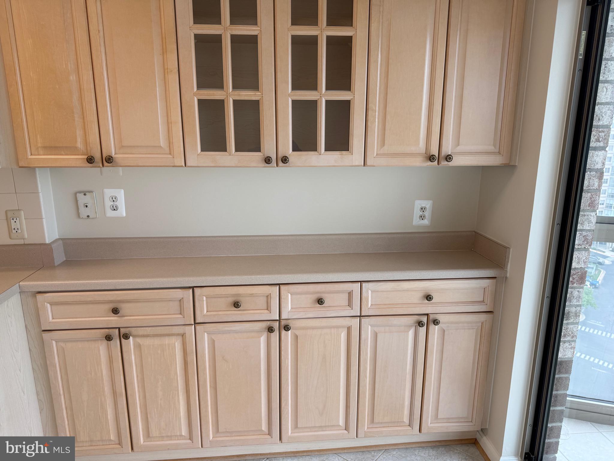 19375 Cypress Ridge Terrace, Unit 1111 Leesburg, VA 20176 - Photo 9 of 52 Extra cabinets from the builder