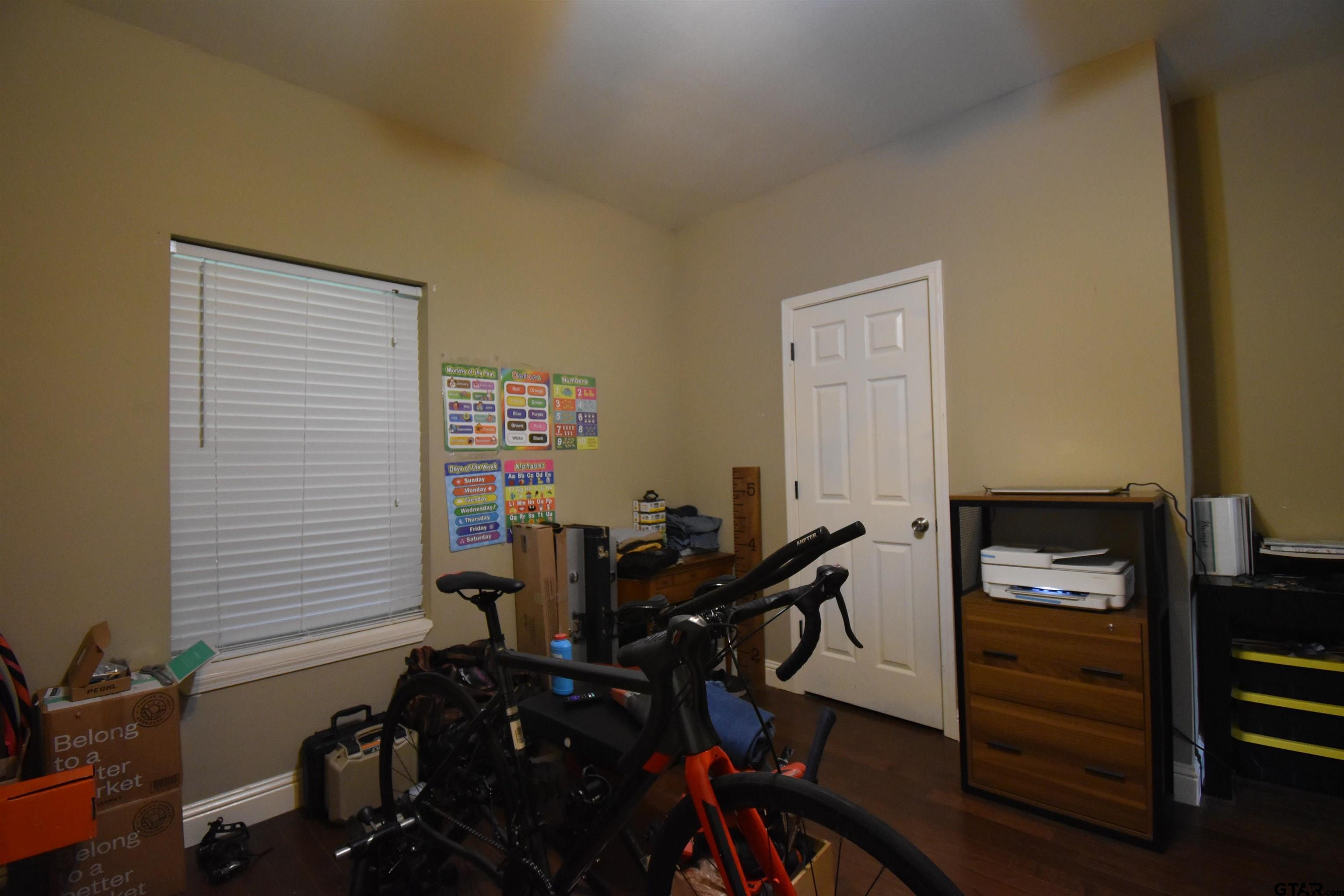 7727 Knowles Trace Tyler, TX 75708 - Photo 28 of 34 a room with furniture and musical instruments