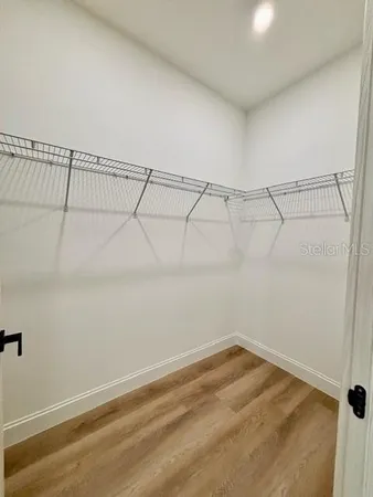 a view of a room with racks on the wall