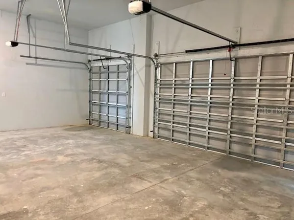 a view of empty room with garage