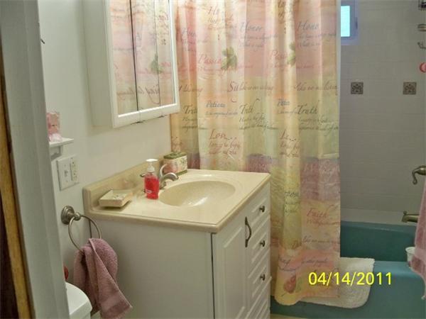 177 Palmer Road Monson, MA 01057 - Photo 17 of 28 a bathroom with a sink and a mirror
