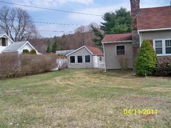 177 Palmer Road Monson, MA 01057 - Photo 2 of 28 a house view with garden space