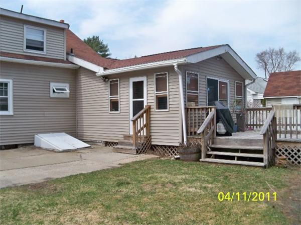 177 Palmer Road Monson, MA 01057 - Photo 4 of 28 a view of a house with a yard and wooden fence