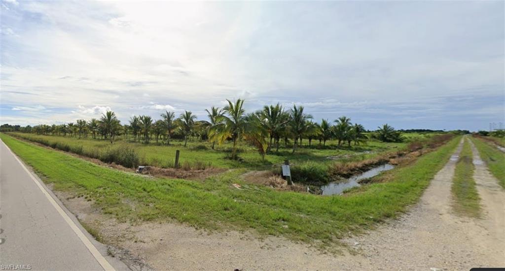 2XX Southwest 127th Avenue Miami, FL 33184 - Photo 4 of 11 a view of a lake with green space