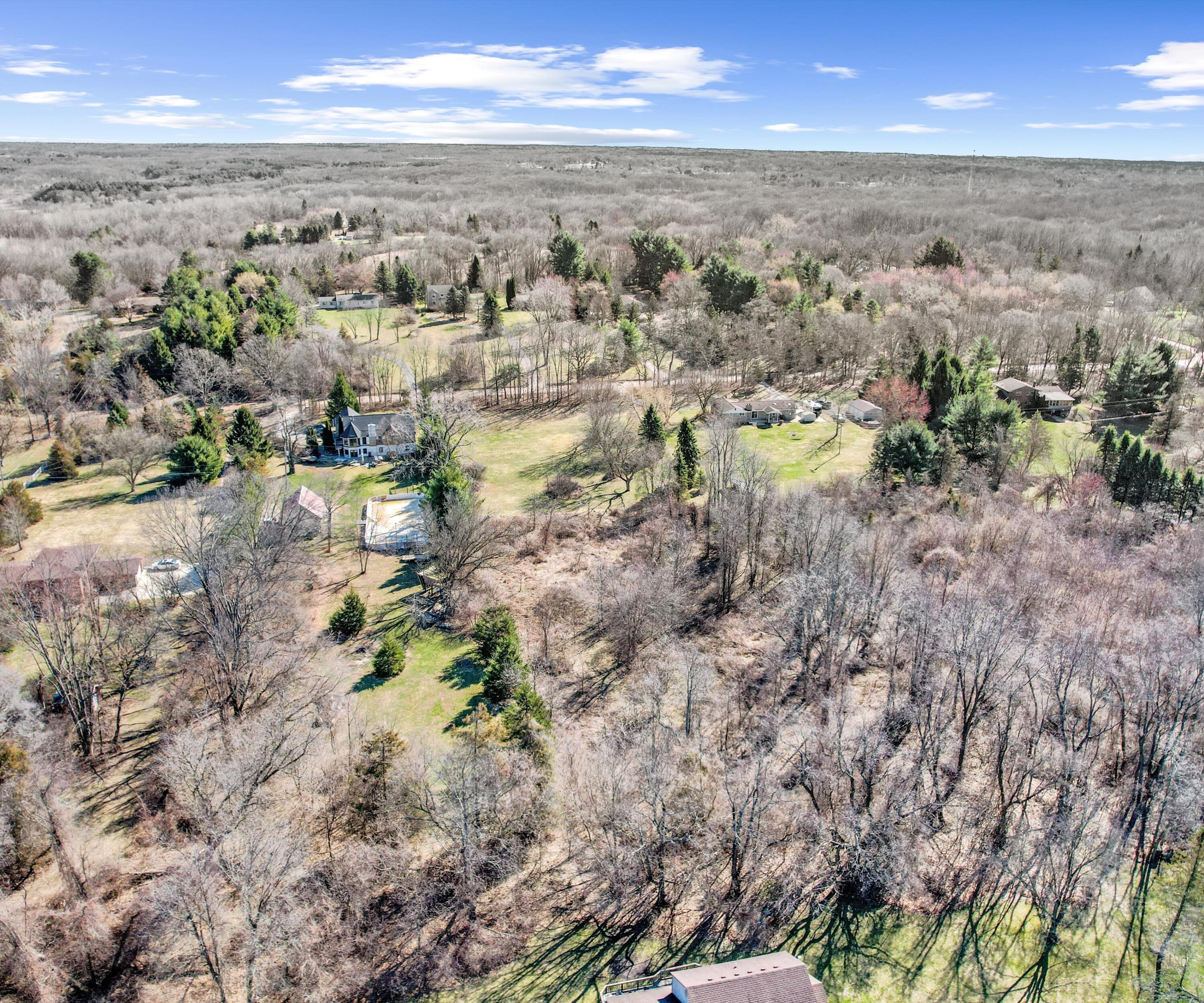 1480 Old Plank Road Milford, MI 48381 - Photo 2 of 23 The Benefit of this Milford Lot (2)