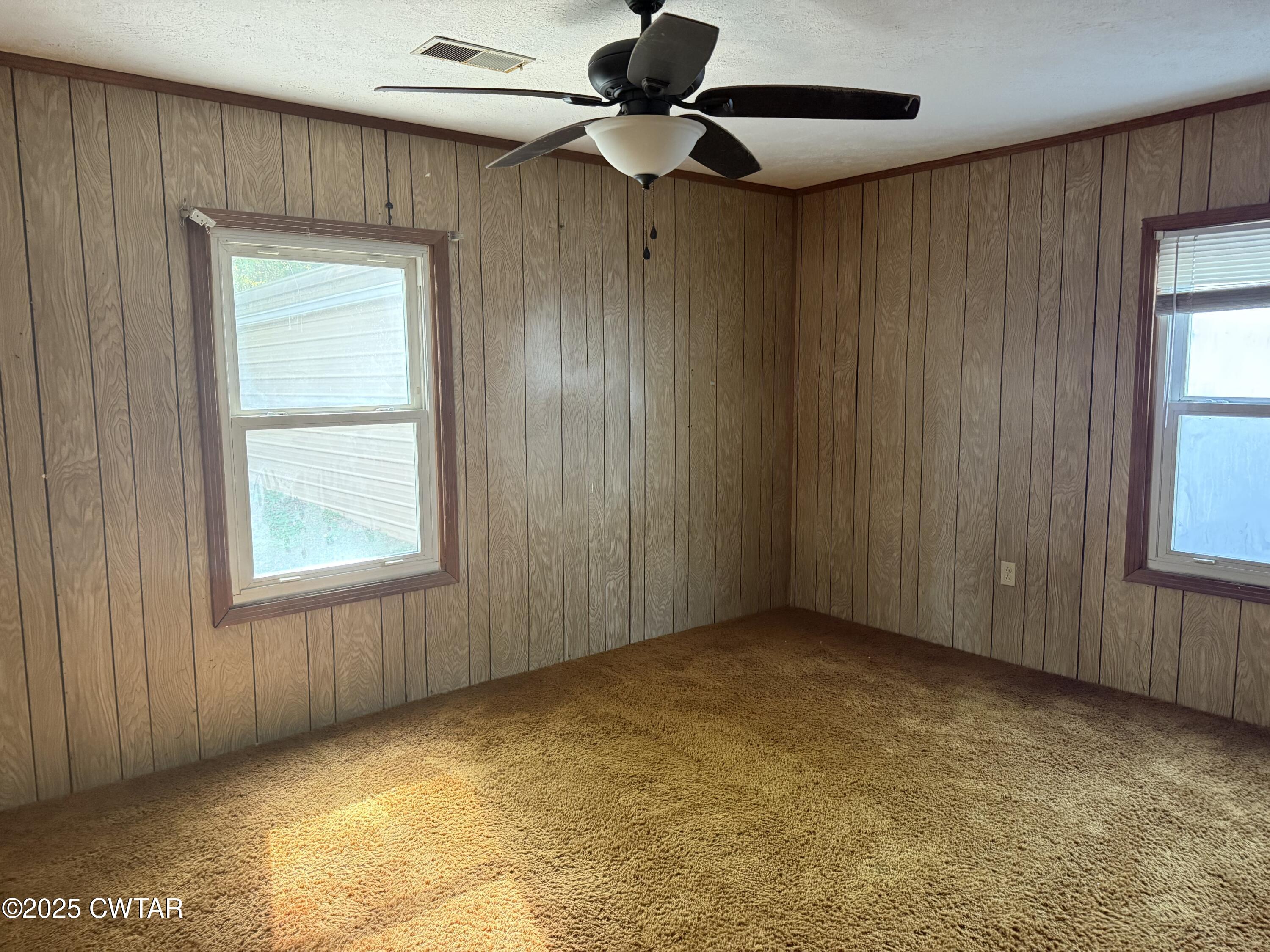 402 Harts Bridge Road Jackson, TN 38301 - Photo 7 of 15 a view of an empty room with a window