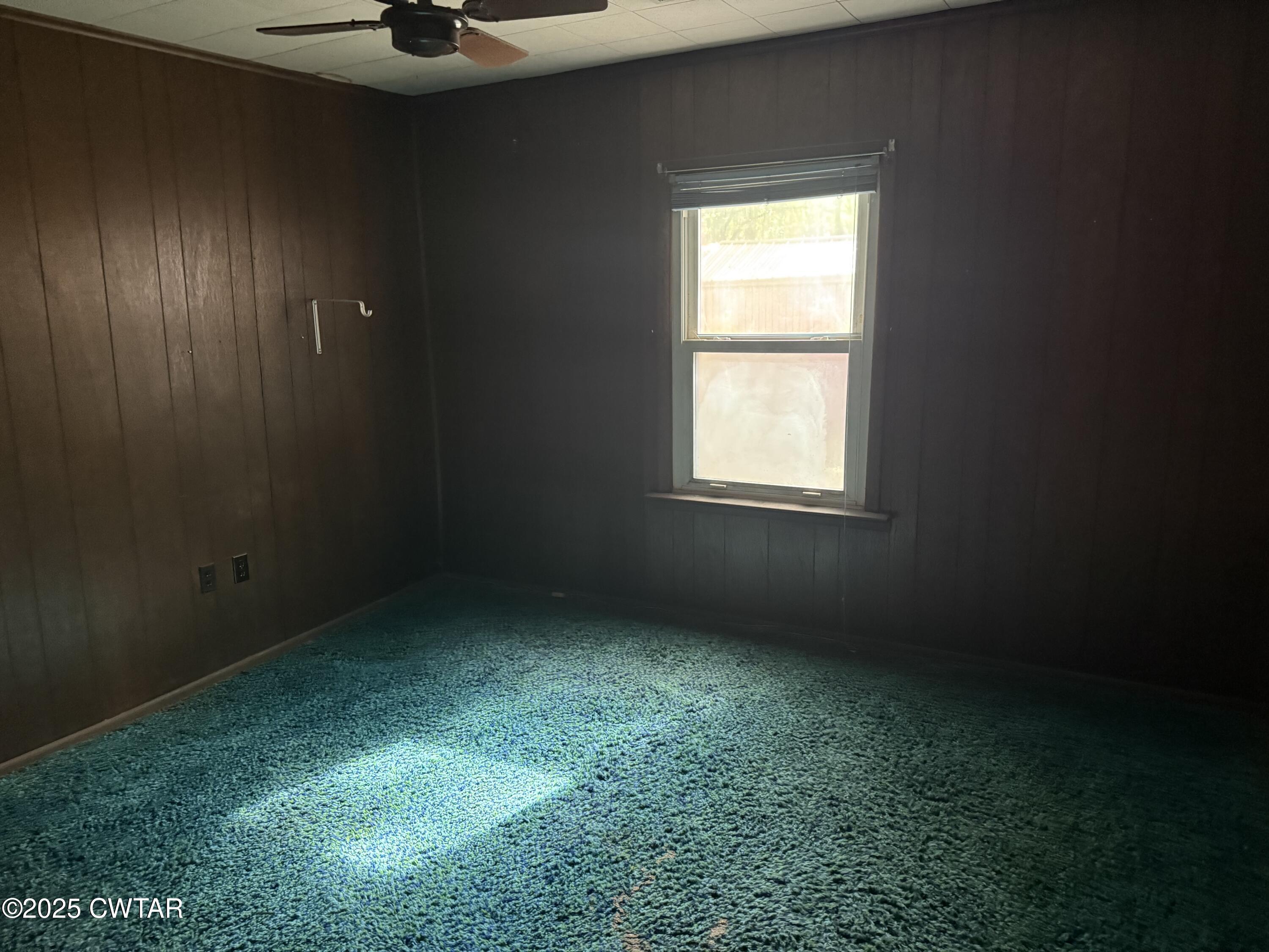 402 Harts Bridge Road Jackson, TN 38301 - Photo 9 of 15 an empty room with a window