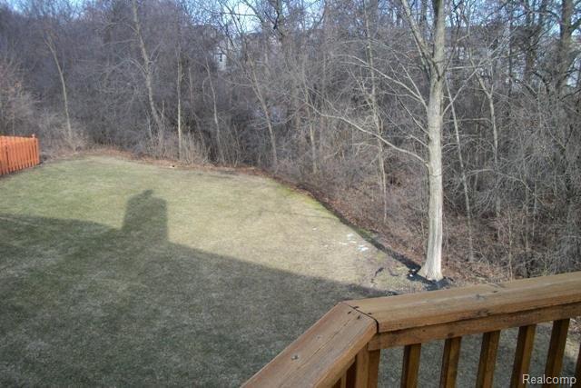 6006 Ravine Court Clarkston, MI 48348 - Photo 12 of 20 Deck overlooks huge yard