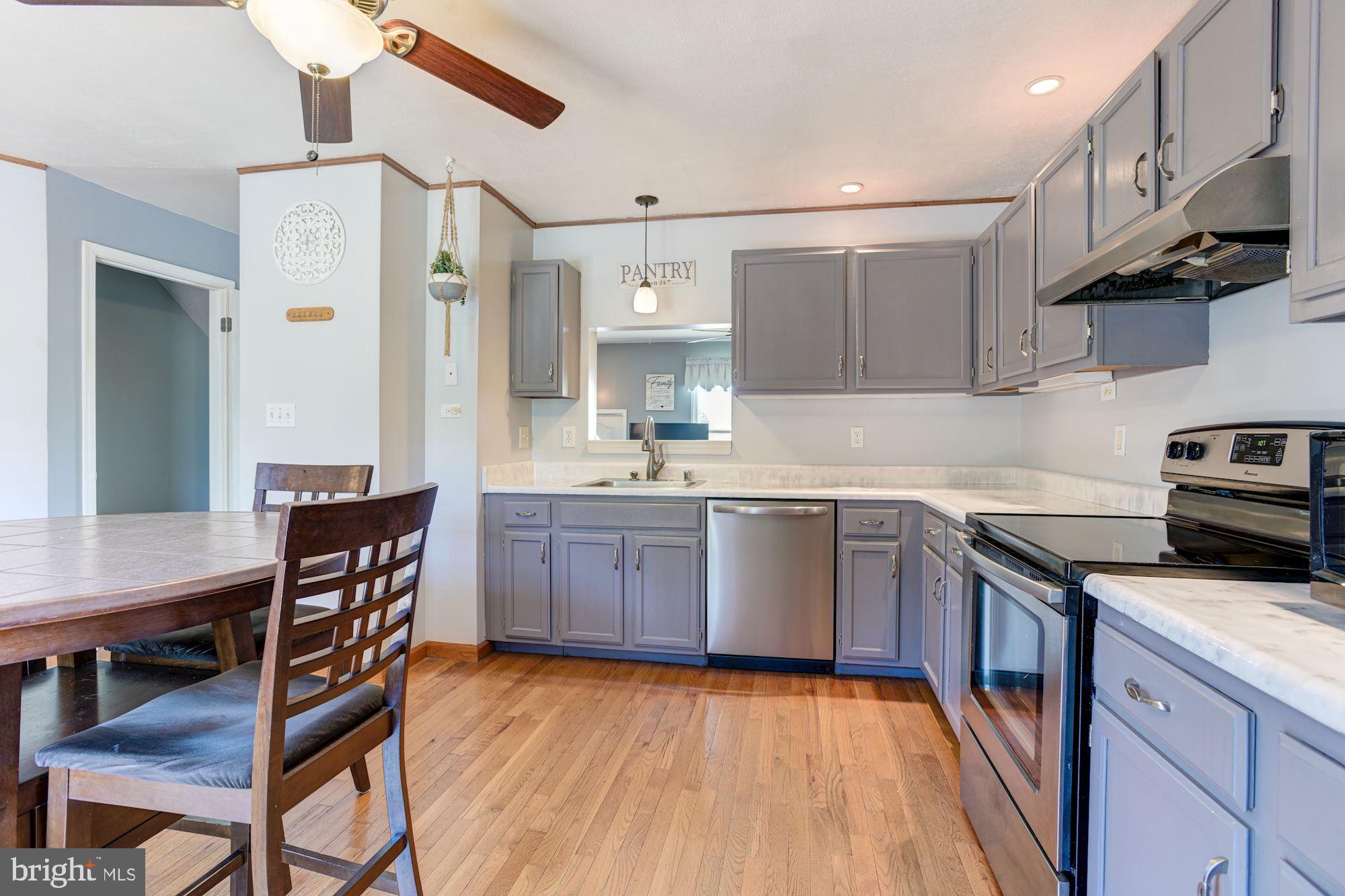 2031 Putnam Road Halethorpe, MD 21227 - Photo 7 of 25 Eat-In Kitchen | Hardwood Floors