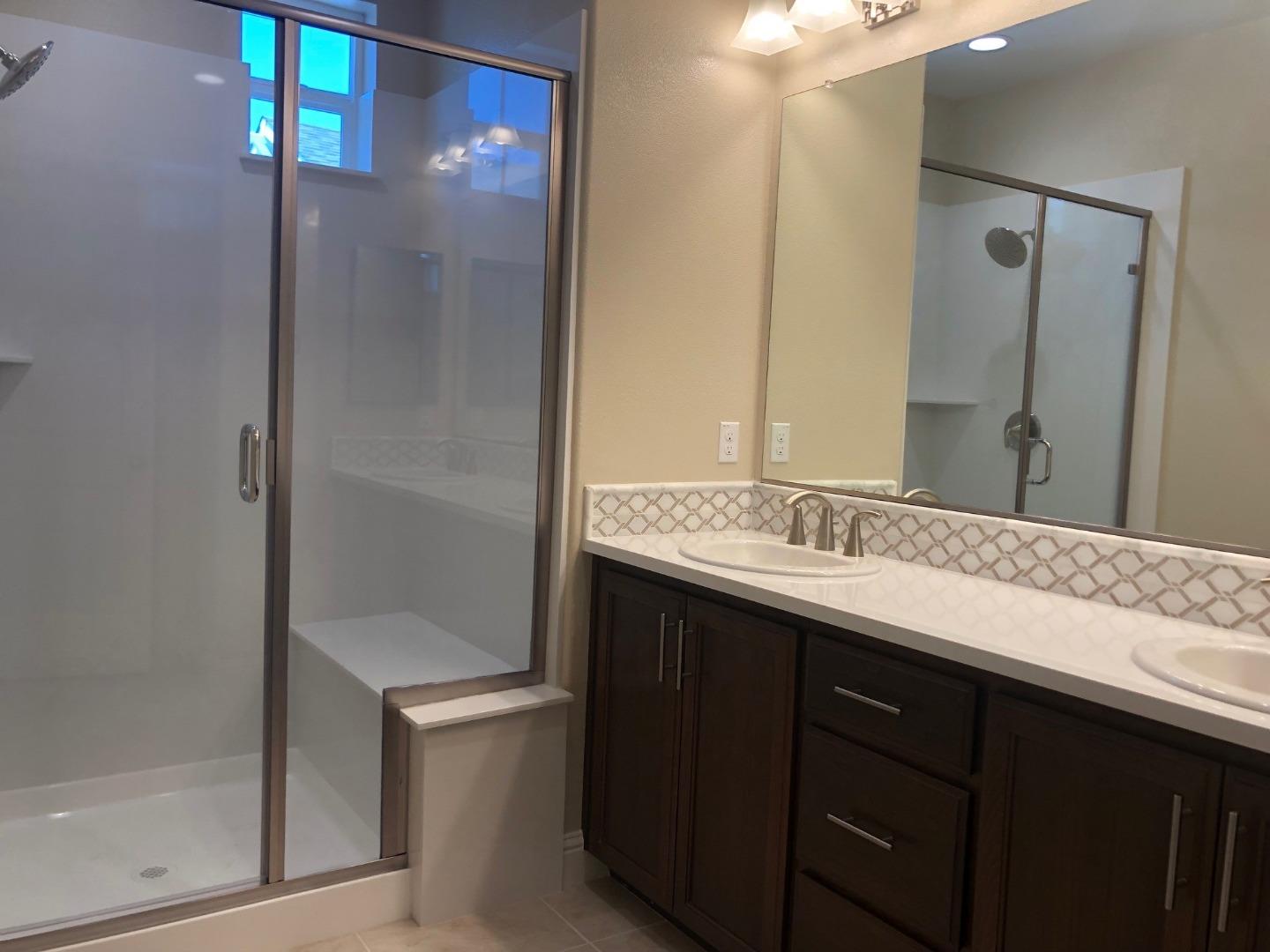 263 Wild Rose Way Milpitas, CA 95035 - Photo 15 of 30 a bathroom with a sink and mirror