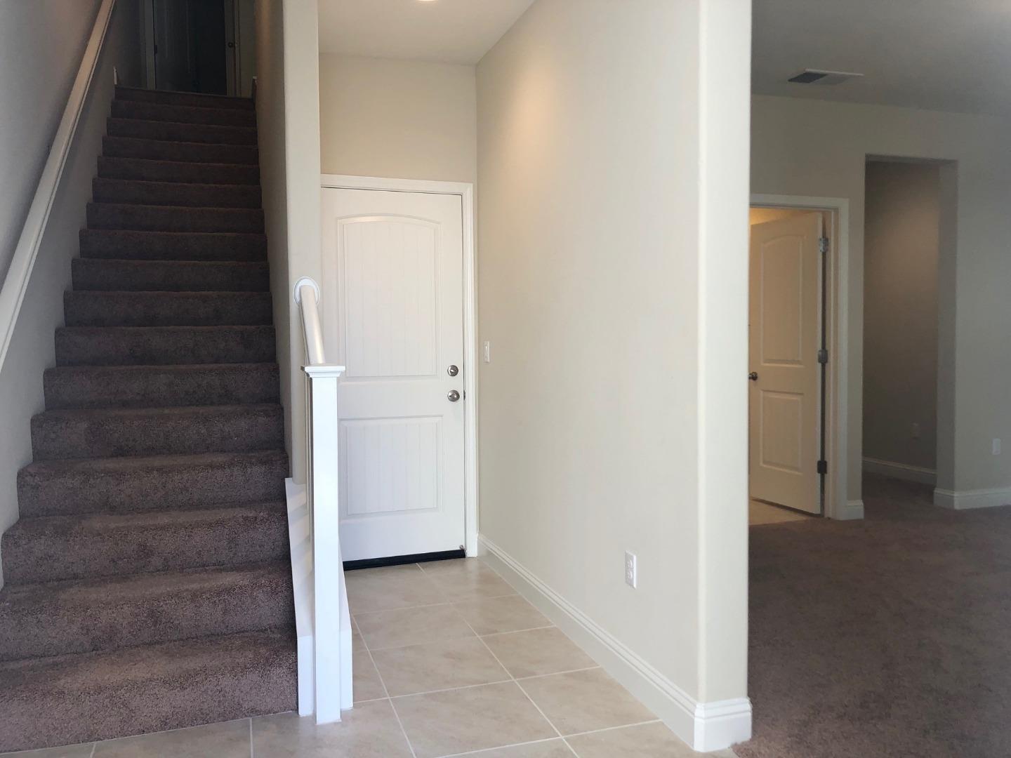 263 Wild Rose Way Milpitas, CA 95035 - Photo 3 of 30 a view of an entryway with staircase