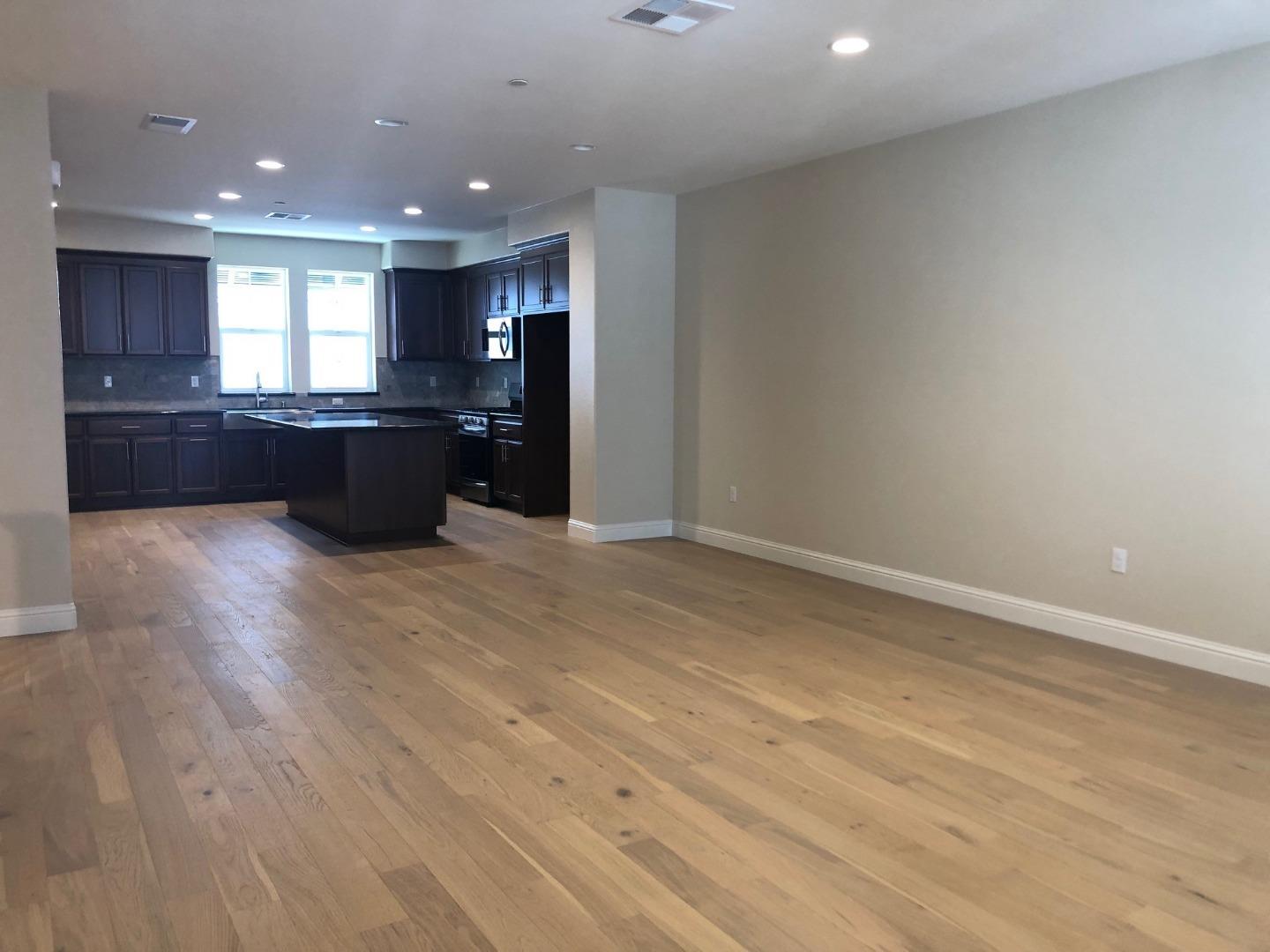 263 Wild Rose Way Milpitas, CA 95035 - Photo 7 of 30 a view of kitchen with refrigerator and windows