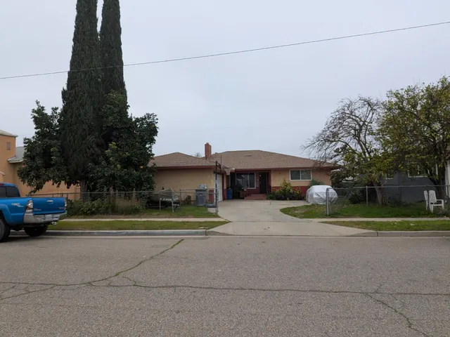 a yellow house with outdoor space