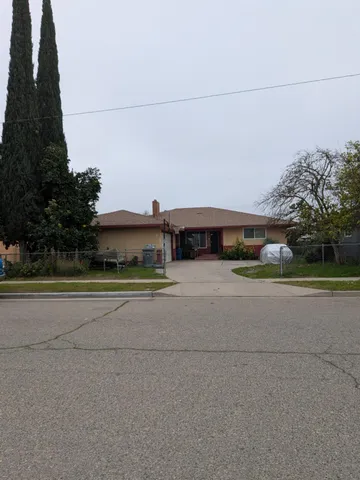 a view of a street with houses
