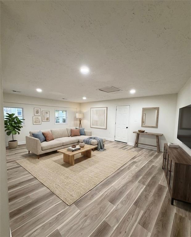 6855 Kimberly Mill Road Atlanta, GA 30349 - Photo 7 of 11 a living room with furniture and a table