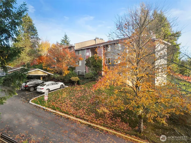 a view of a backyard with sitting area