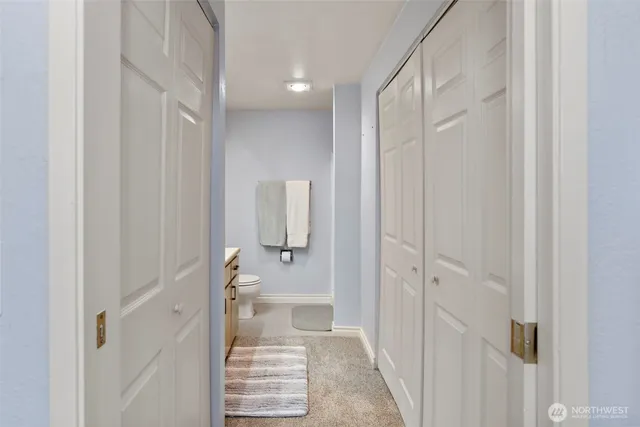 a bathroom with a shower and a sink