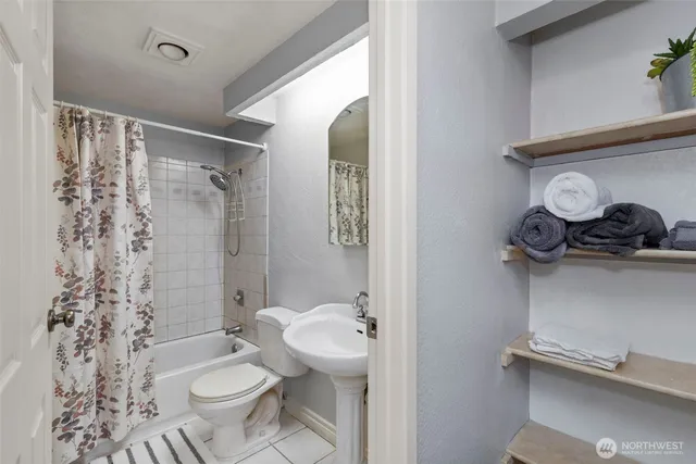 a view of hallway with washer and dryer