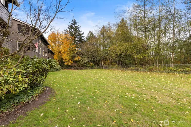 a view of a car park in front of house