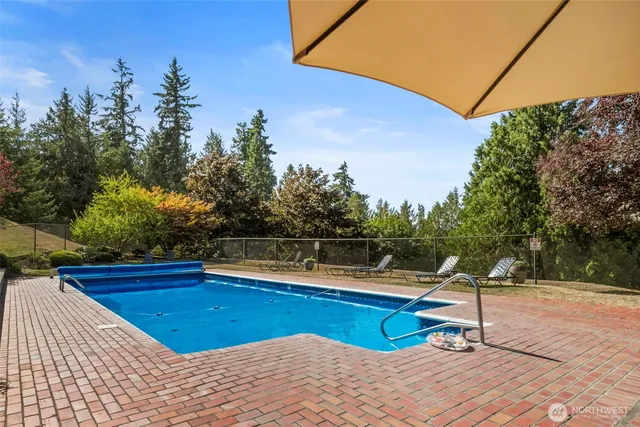 a view of a balcony with wooden floor