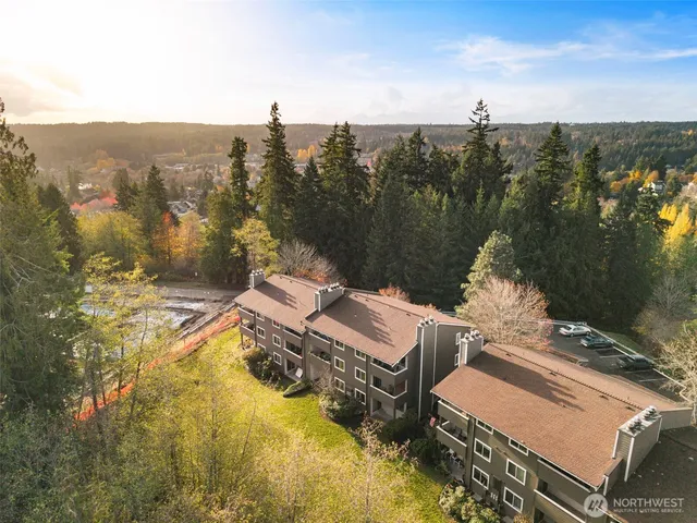 a view of a terrace with a table and chairs