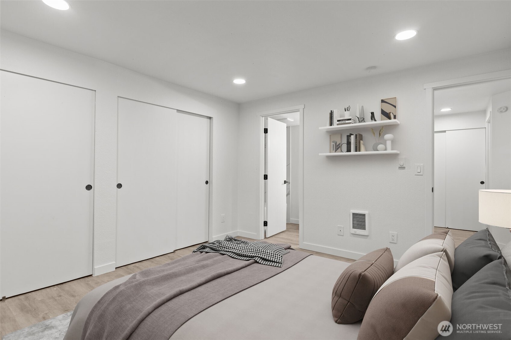 138 Southwest 116th Street, Unit G15 Seattle, WA 98146 - Photo 13 of 21 a bedroom with a bed and closet