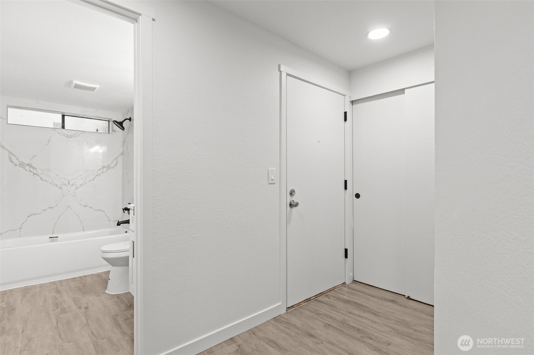 138 Southwest 116th Street, Unit G15 Seattle, WA 98146 - Photo 15 of 21 a bathroom with a sink and a mirror