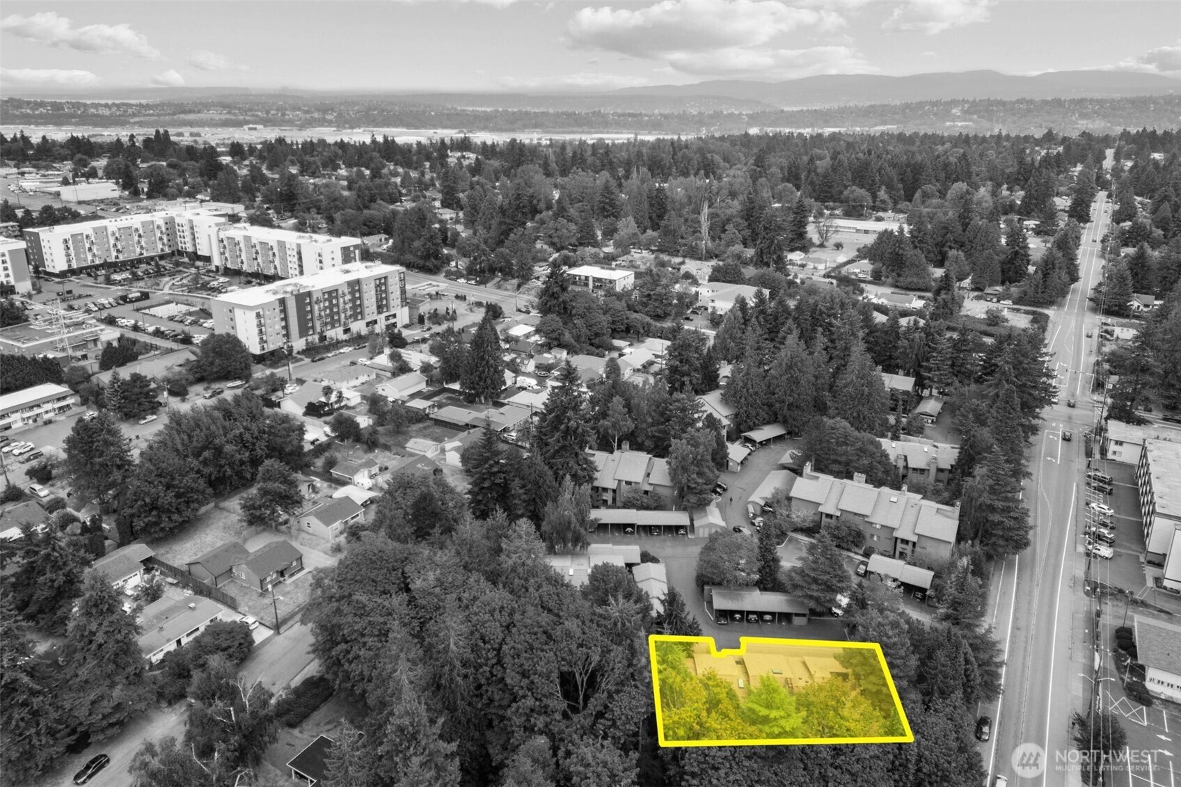 138 Southwest 116th Street, Unit G15 Seattle, WA 98146 - Photo 21 of 21 an aerial view of residential houses with yard and ocean view