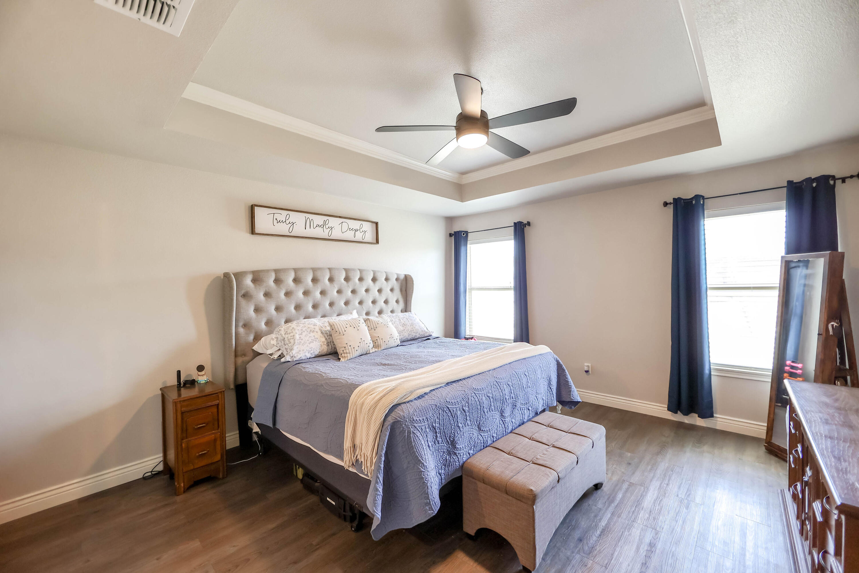 6008 103rd Street Lubbock, TX 79424 - Photo 12 of 29 a bedroom with a bed and a window
