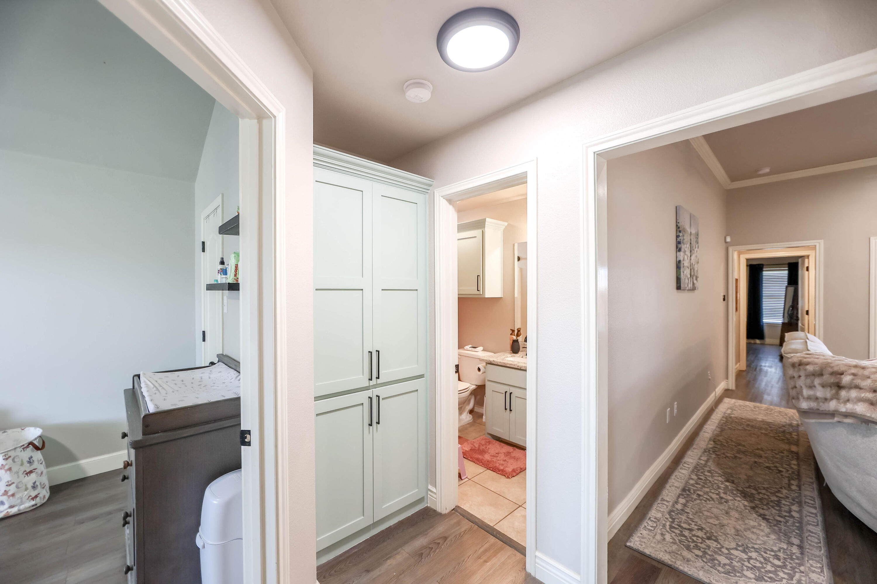 6008 103rd Street Lubbock, TX 79424 - Photo 19 of 29 a view of hallway with wooden floor