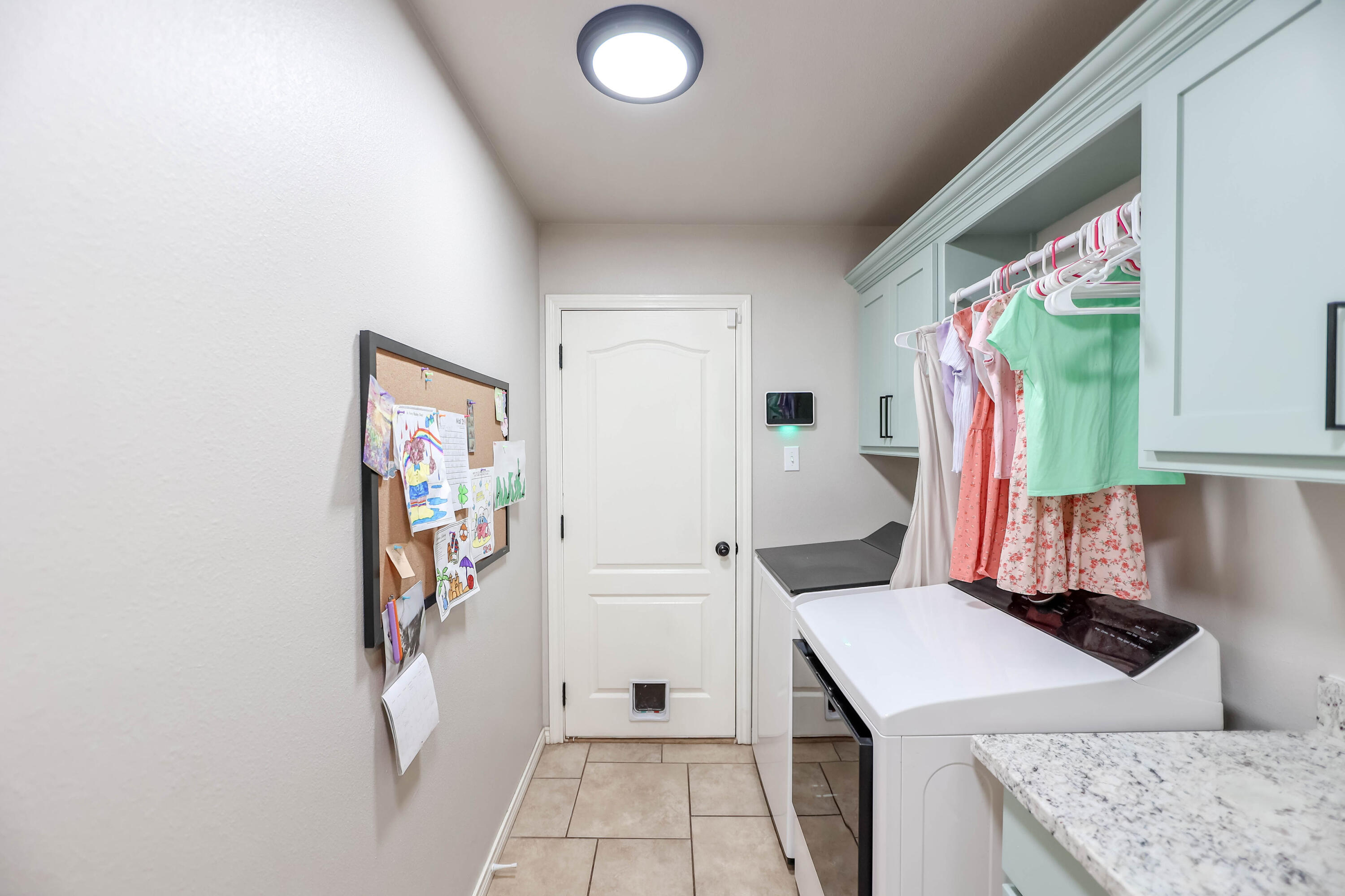 6008 103rd Street Lubbock, TX 79424 - Photo 25 of 29 a bathroom with a sink a vanity and a mirror