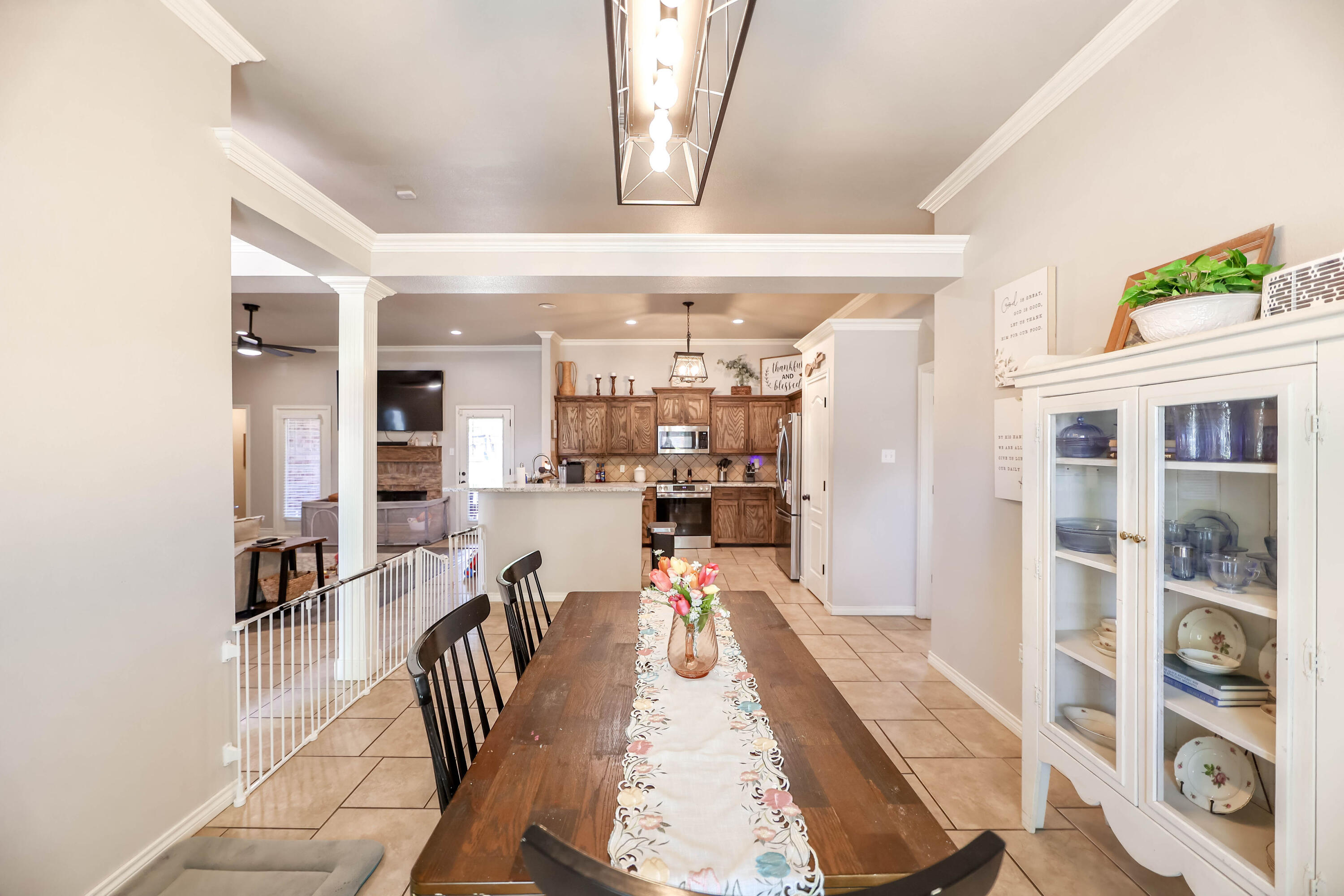 6008 103rd Street Lubbock, TX 79424 - Photo 9 of 29 a view of a living room and dining room