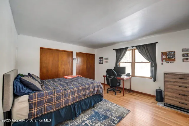 a bathroom with a shower and a toilet