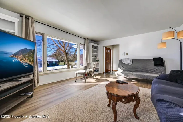 a living room with furniture and a couch